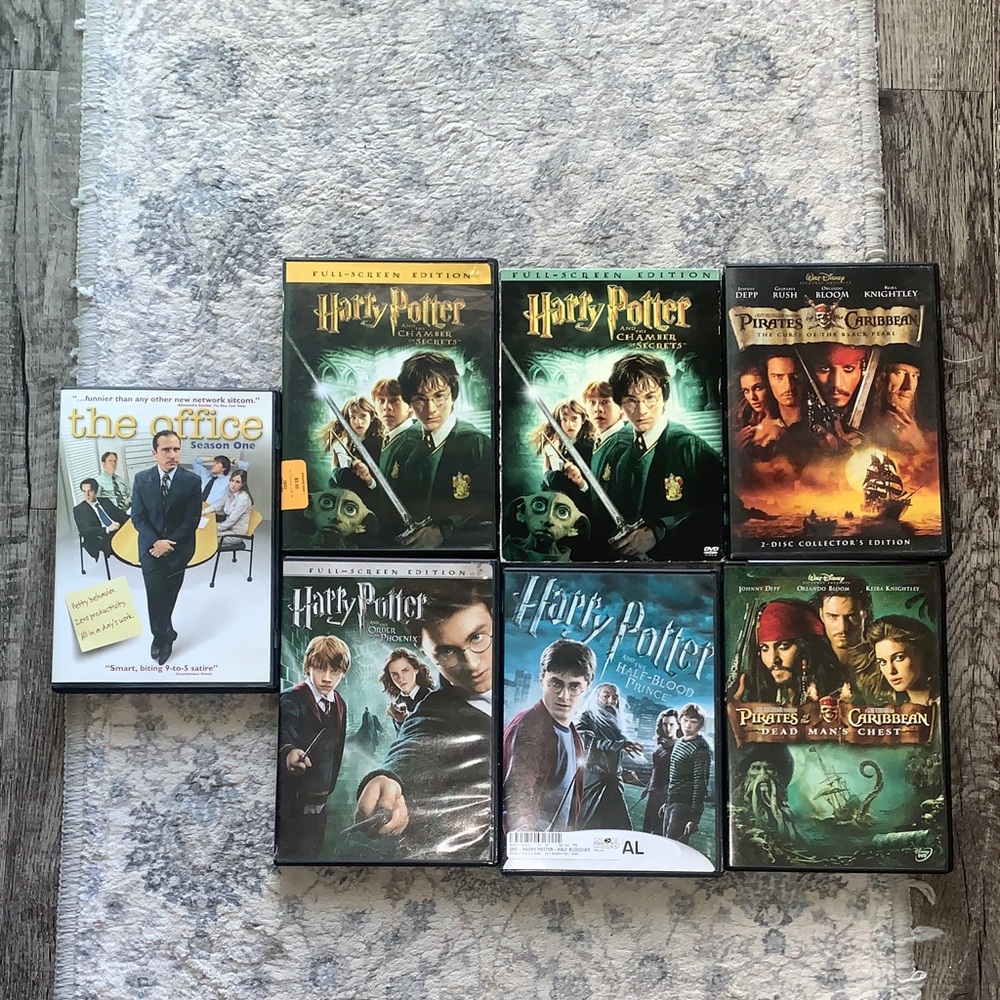 7 Movie DVDs - Harry Potter, The Office, & Pirates of the Caribbean